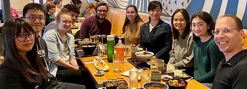 Kritzer Lab members eating sushi