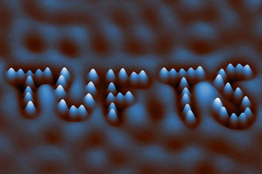 the word "Tufts" spelled with bromine atoms using the low-temperature scanning tunneling microscopy