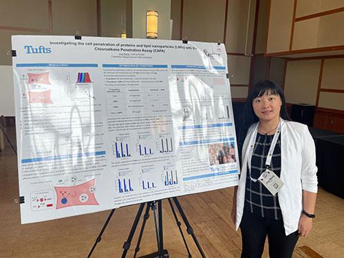 Jing Wang presenting the poster at NERM 2023
